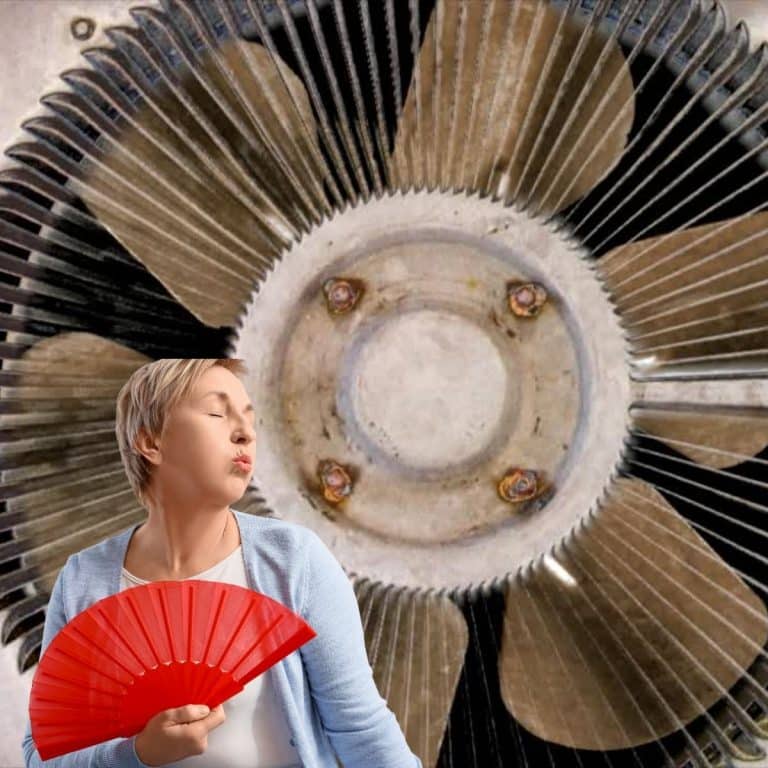 Woman with a red fan standing in front of old HVAC unit outdoors