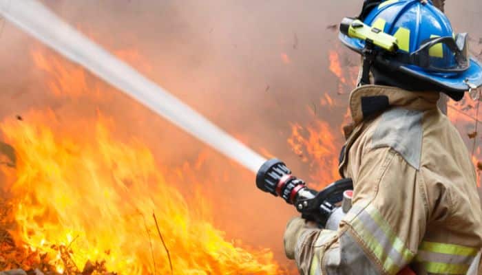 Fire fighter putting out a fire in Califorina